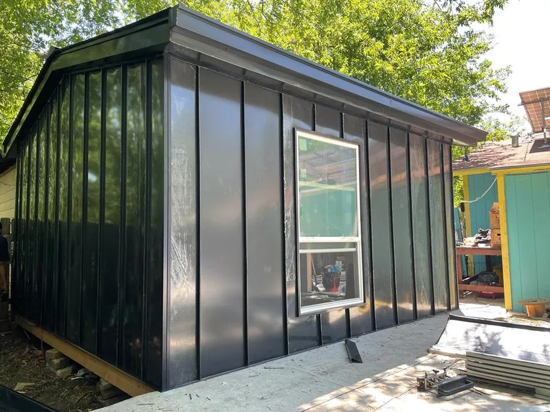 Black standing seam metal wall panels for Metal Roof Installation in Pleasant Grove