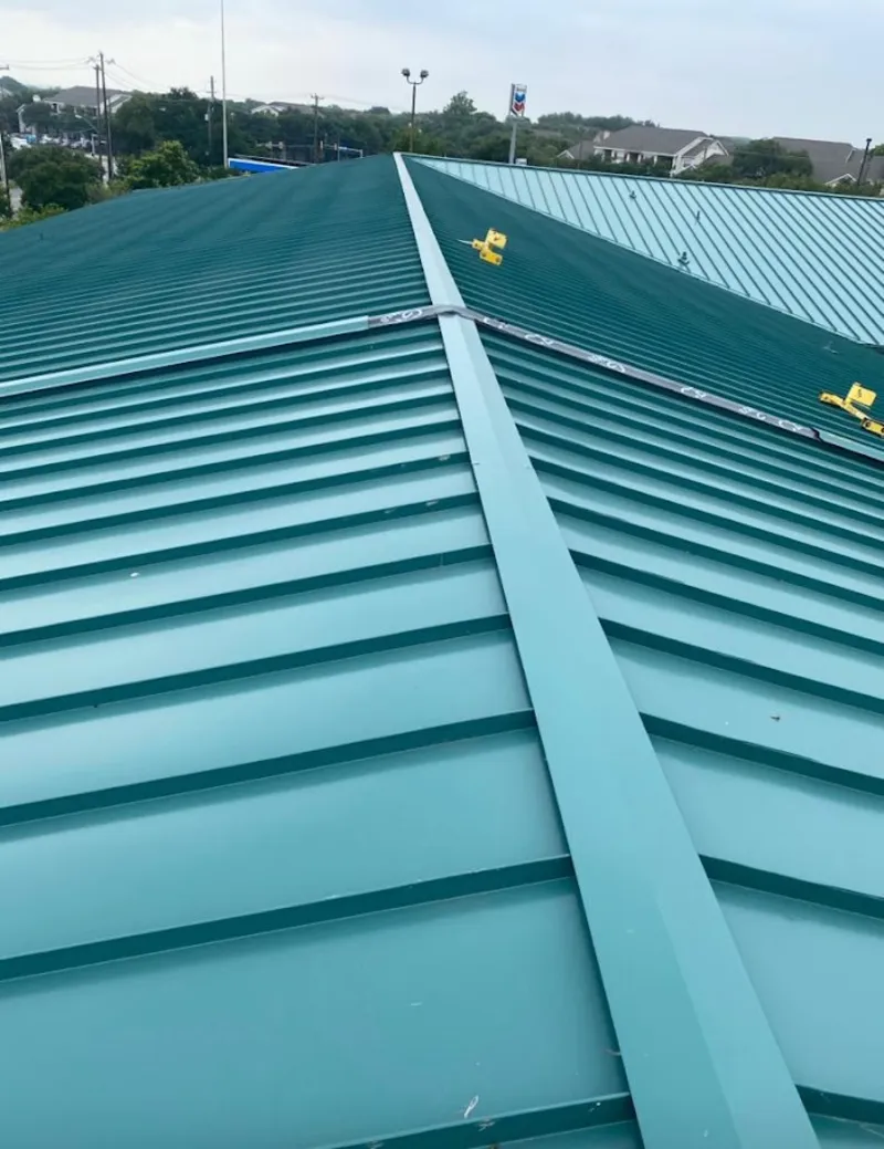 Green commercial metal roof ridge and valley for Metal Roof Repair in Pleasant Grove